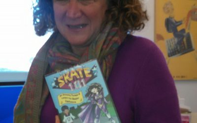 Dr. Barbara “Bobbi” Kurshan showing off her copy of the Skate 101 DVD